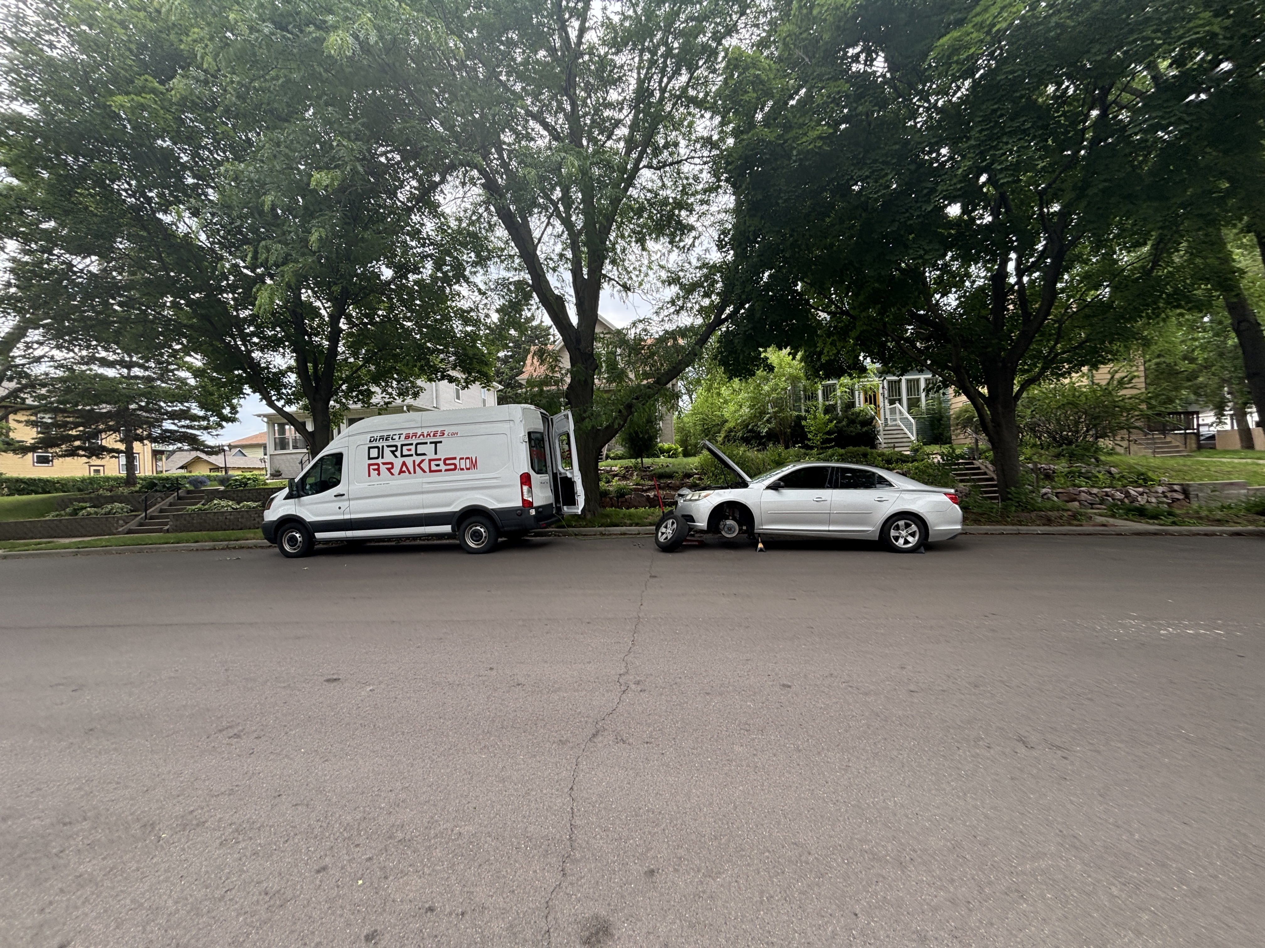Direct Brakes Mobile Repair technician replacing Chevrolet battery at customer home in Sioux Falls