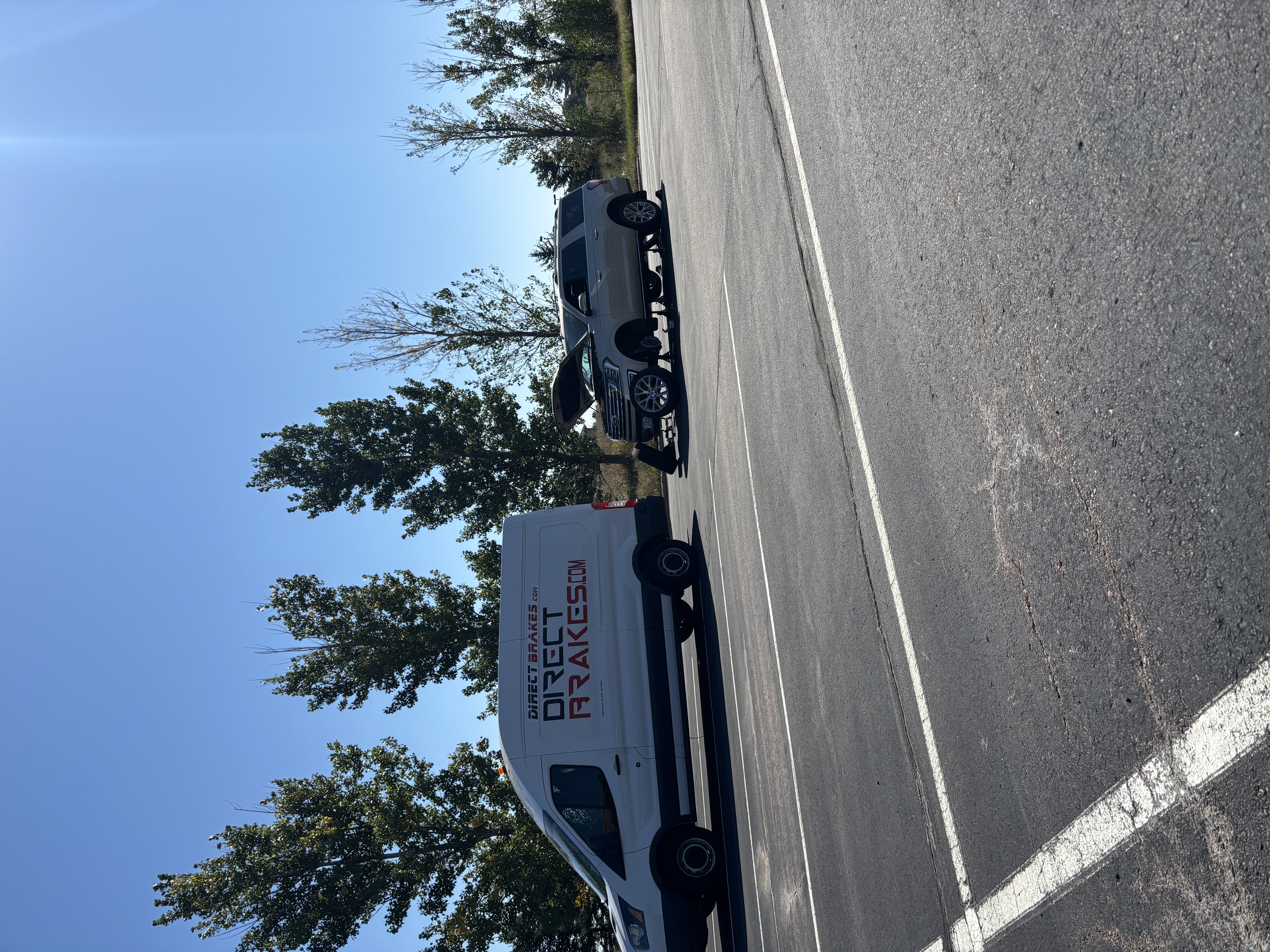 Technician testing GMC battery