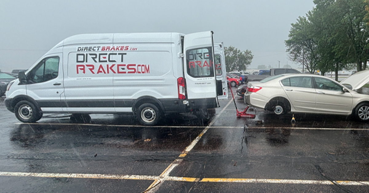 Mechanic measuring brake rotor