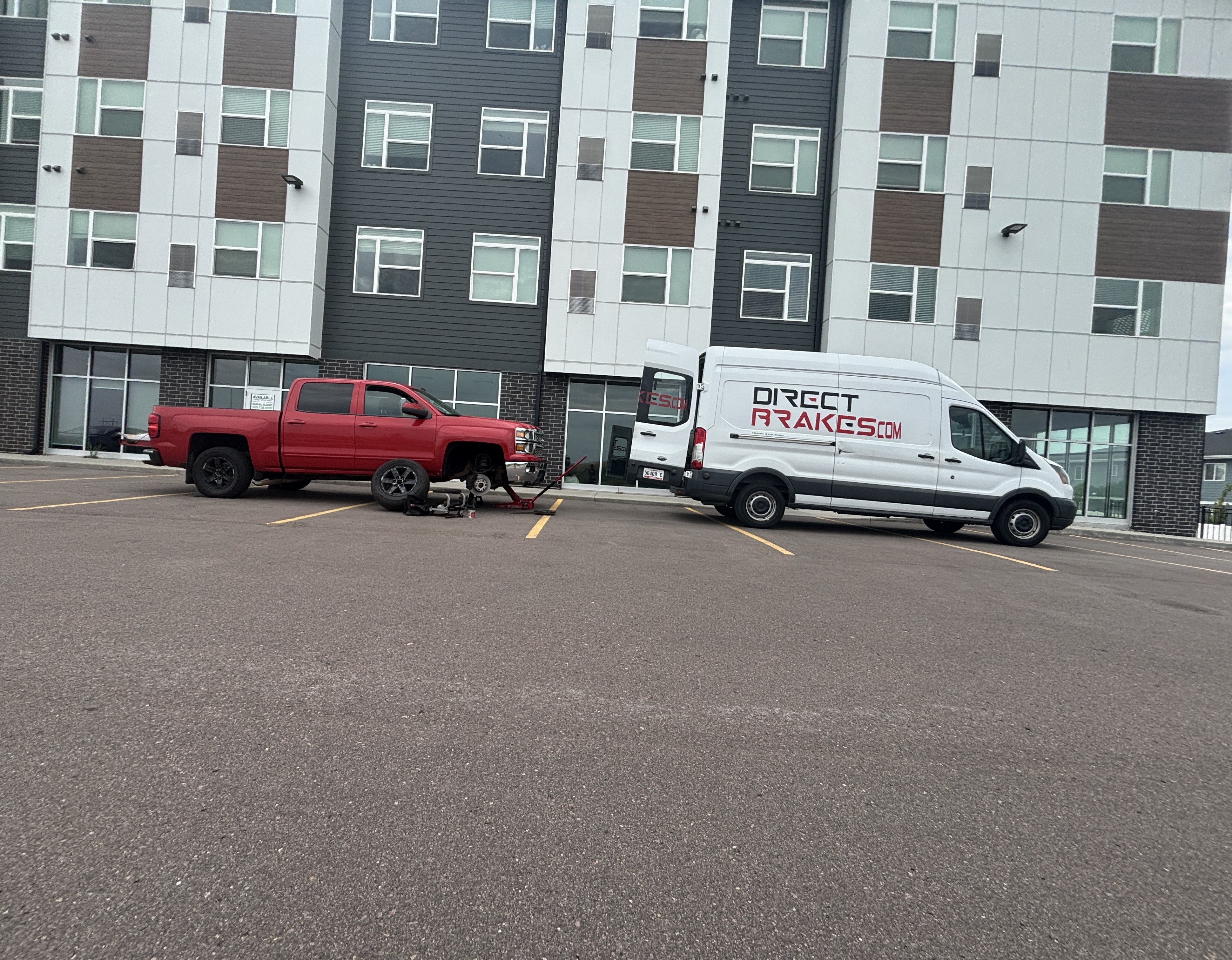 Mobile technician servicing fleet vehicle