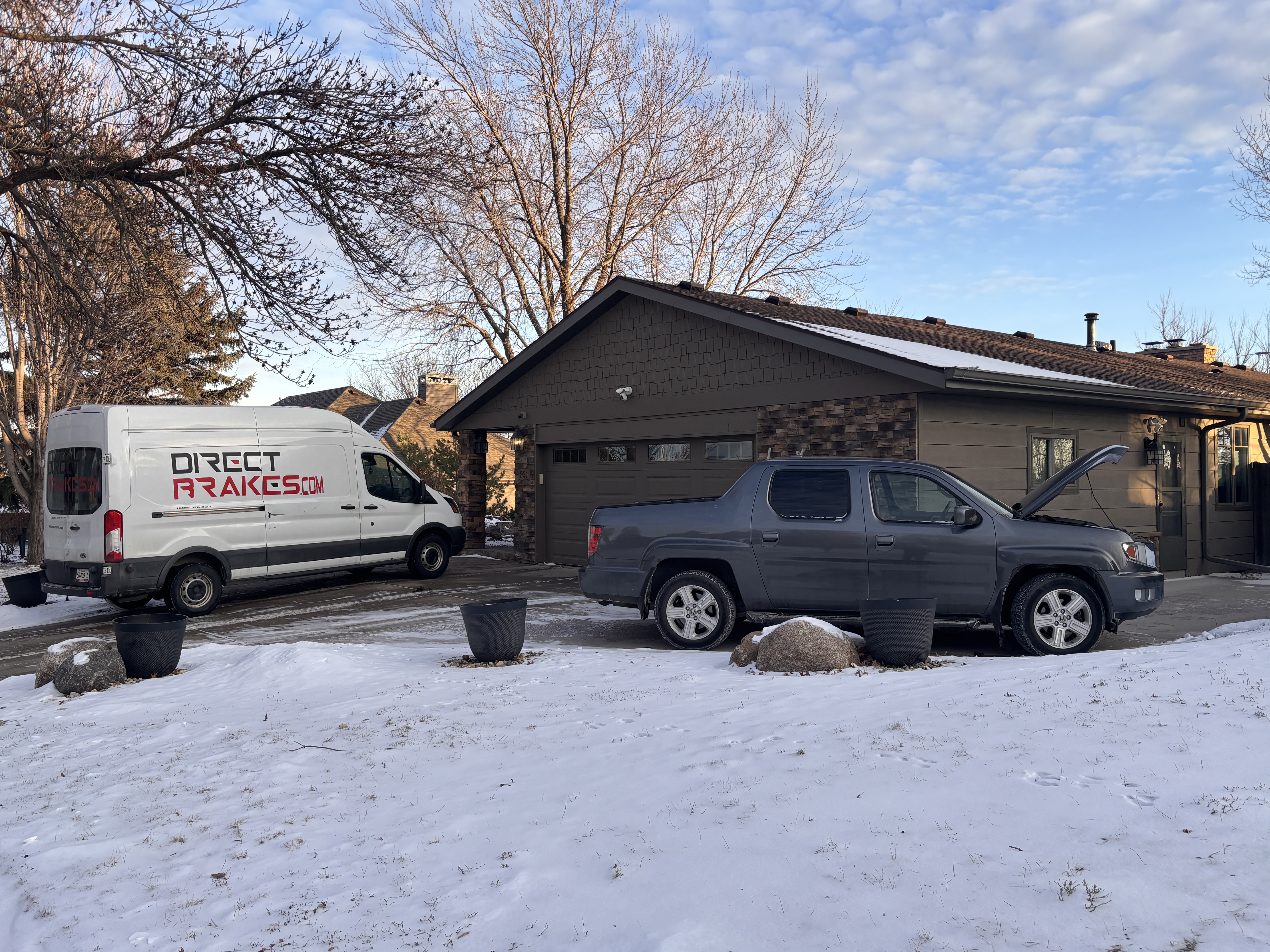 Mobile Chevrolet brake repair service in Sioux Falls - technician servicing Chevy Silverado