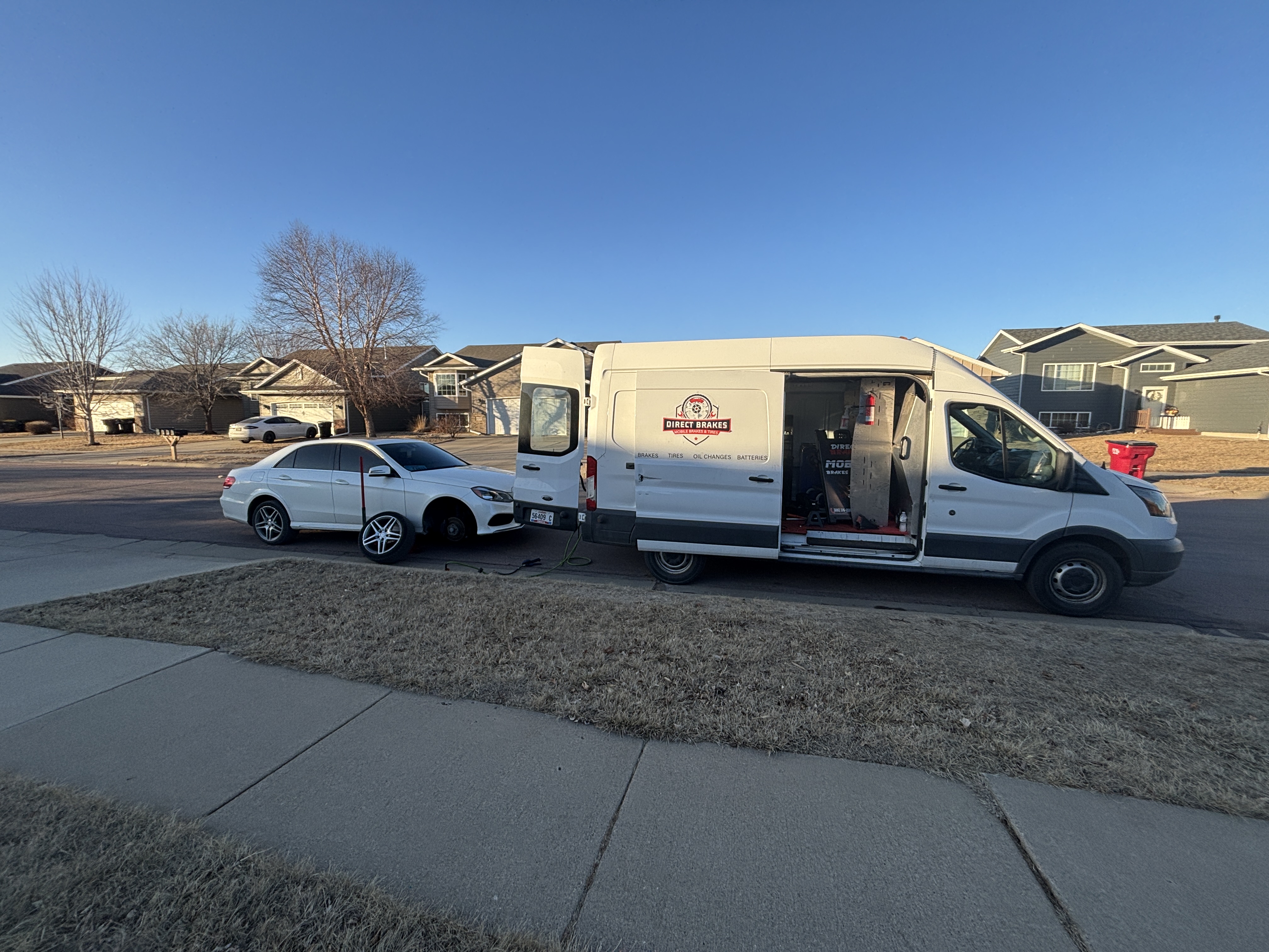 BMW brake system with M Sport blue calipers and drilled rotors